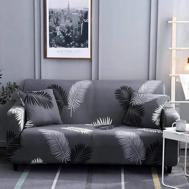 Housse canapé extensible MAGICTIF motif floral hydrofuge - style bohème intérieur