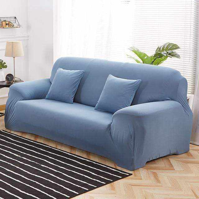 Vue latérale housse de canapé extensible SLIM - maintien optimal sur les accoudoirs