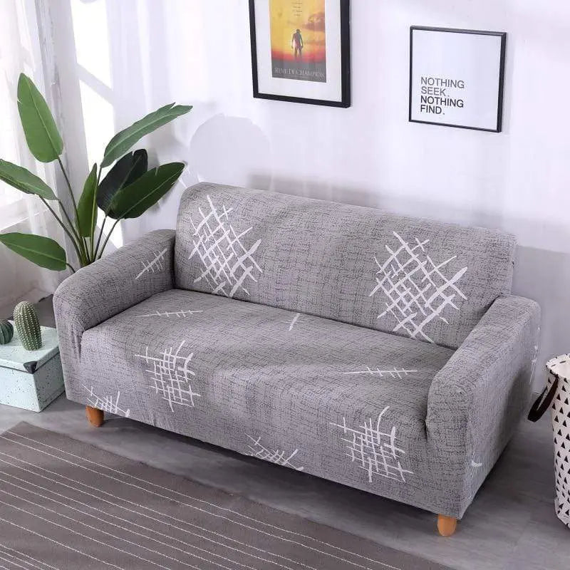 Housse canapé imperméable extensible MAGICTIF - rendu salon moderne avec motif